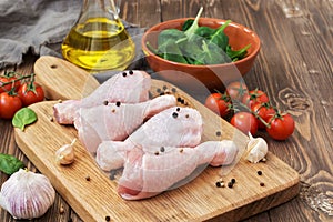 Raw chicken drumstick.