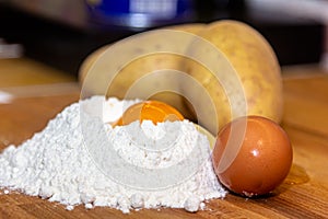 Raw chicken egg and flour on white background,homemade food, homemade pasta