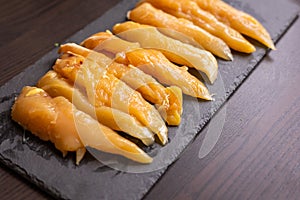 Raw chicken fille closeup on the kitchen table photo