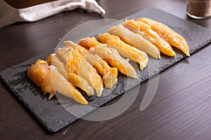 Raw chicken fille closeup on the kitchen table photo