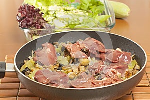 Raw chicken liver with vegetables