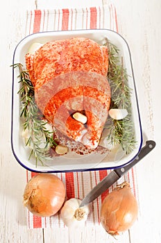 Raw chicken with a marinade made of paprika powder