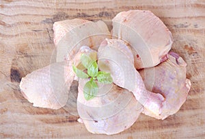 Raw chicken pieces photo