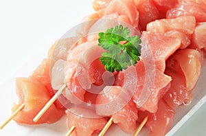 Raw chicken skewers
