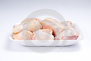 Raw chicken tender curry cut with skin