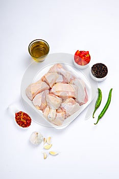 Raw chicken tender curry cut with skin