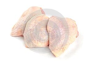 Raw chicken thigh isolated on white background