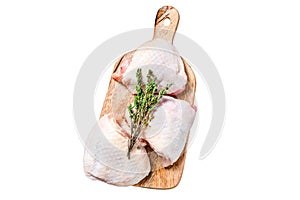 Raw chicken thigh, organic poultry meat. Isolated on white background. Top view.