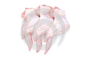 Raw Chicken wings isolated on white background. Three fresh chicken wings for cooking. Close-up. Top view.