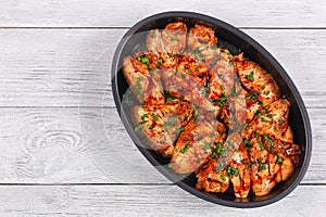 Raw chicken wings prepared for roast