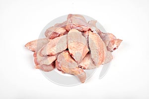 Raw chicken wings on white background