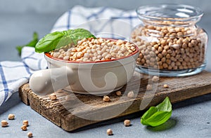 Raw chickpeas and green basil photo