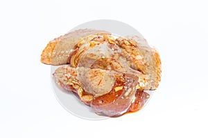 Raw chiken meat on a light background