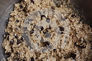 Raw Chocolate chips and oatmeal cookie batter