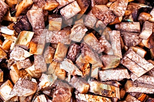 Raw chopped mushrooms in a frying pan. Closeup