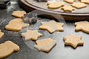 Raw Christmas cookies on table