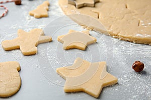 Raw Christmas cookies on table Festive treats