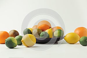 Raw citruses on plate