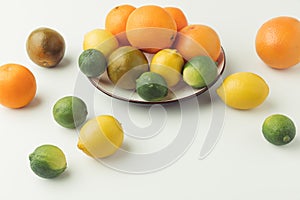Raw citruses on plate
