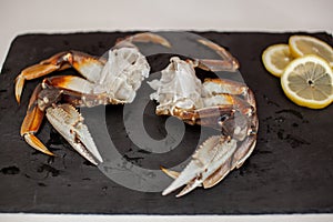 Raw cleaned uncooked Dungeness crab legs