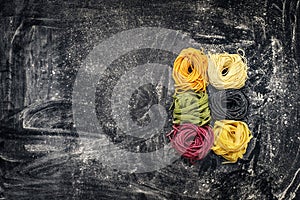 Raw colored vegetables pasta nest