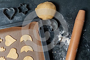 Raw Cookies on a baking sheet, displayed on Slate plate