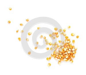 Raw corn kernels on white background