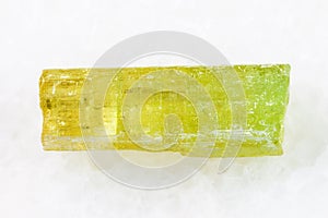 raw crystal of Heliodor (yellow beryl) on white