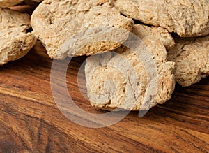 Raw Dehydrated Soy Meat or Soya Chunks on Wood Background