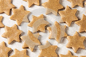 Raw dough. Cooking. Ginger biscuit star