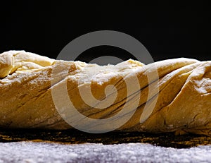 Raw dough on the kitchen table