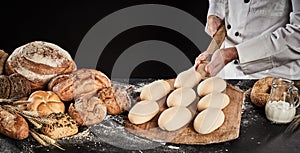 Raw dough for loaves of bread on a wooden paddle