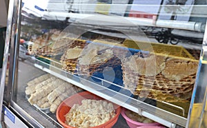 Raw dried shark fin in a showcase for sell at Bangrak, Bangkok, Thailand