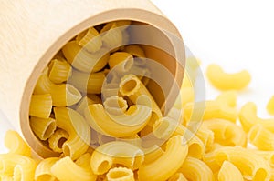 Raw dry elbow macaroni.