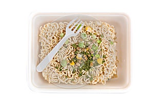 Raw dry instant noodles isolated on a white background