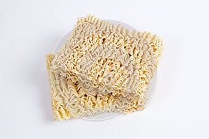 Raw dry instant noodles isolated on a white background