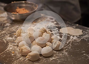 Raw dumplings prepared at the kitchen table