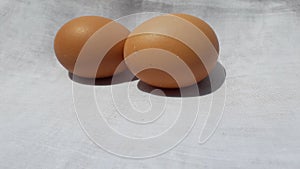 Raw egg or telur in indonesian on white background