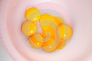 Raw egg yolks photo