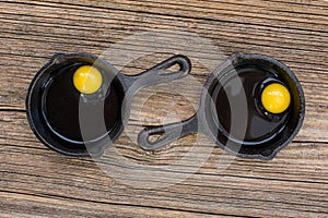 Raw eggs in frying pan ready to cook
