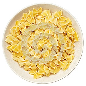 Raw farfalle pasta in a bowl isolated on white background. File Contains Clipping Path