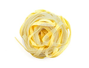 Raw Fettuccine paste isolated on white