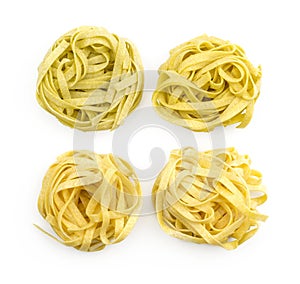 Raw Fettuccine paste isolated on white