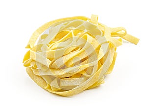 Raw Fettuccine paste isolated on white