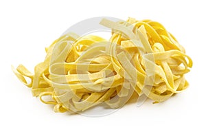 Raw Fettuccine paste isolated on white