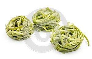 Raw Fettuccine paste isolated on white