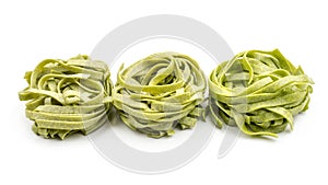 Raw Fettuccine paste isolated on white