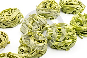 Raw Fettuccine paste isolated on white