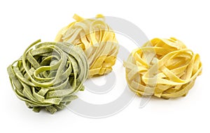 Raw Fettuccine paste isolated on white