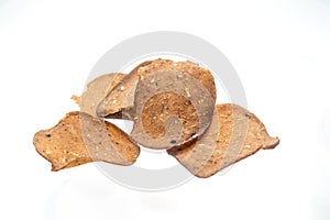Raw fish cracker on white background